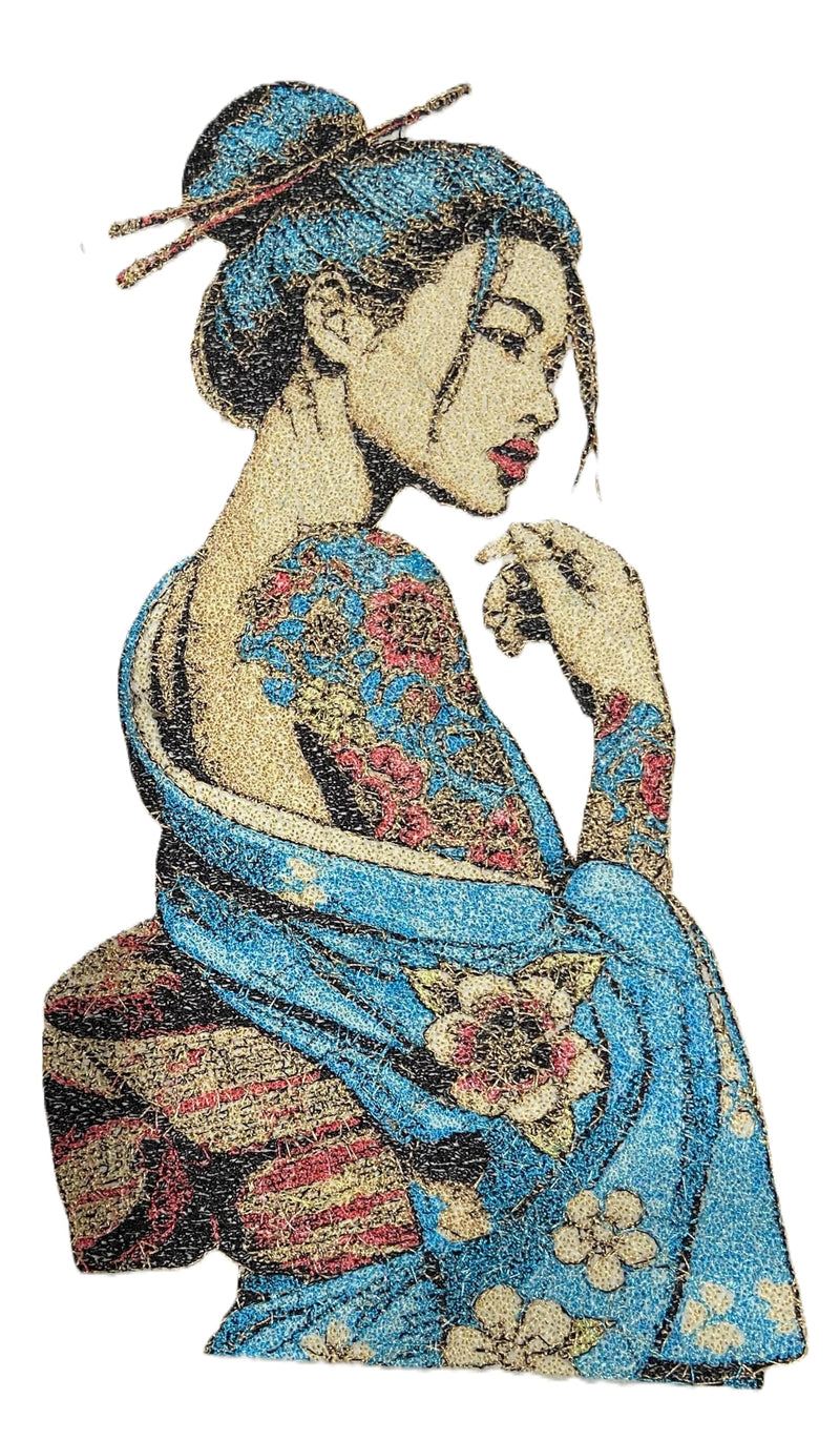 Embroidered patch of a woman in a traditional kimono with floral patterns on a white background