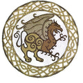 Embroidered design of a winged creature in a circular pattern with intricate designs.