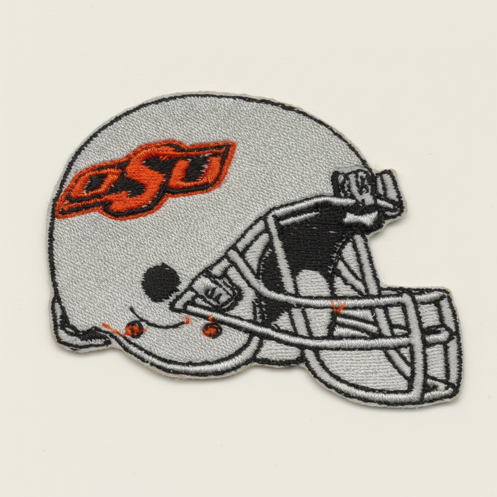 Cleaned orange, white, and black helmet patch image