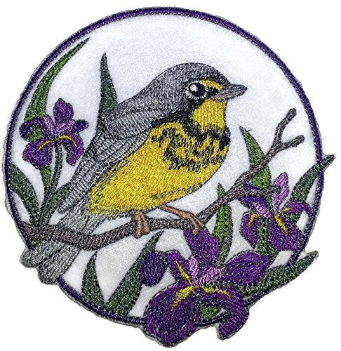 Embroidered patch of a bird on a branch with purple flowers